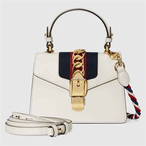 gucci sylvie mini vs small|Gucci sylvie bag 1969.